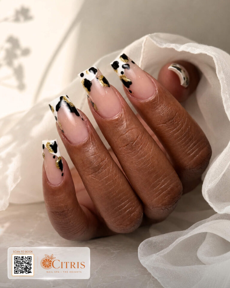 Cream and black patterned gel manicure by Citris Nail Spa