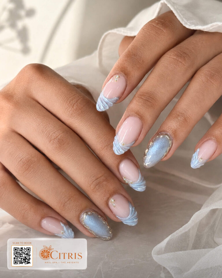 Soft blue French manicure with luminous details by Citris Nail Spa